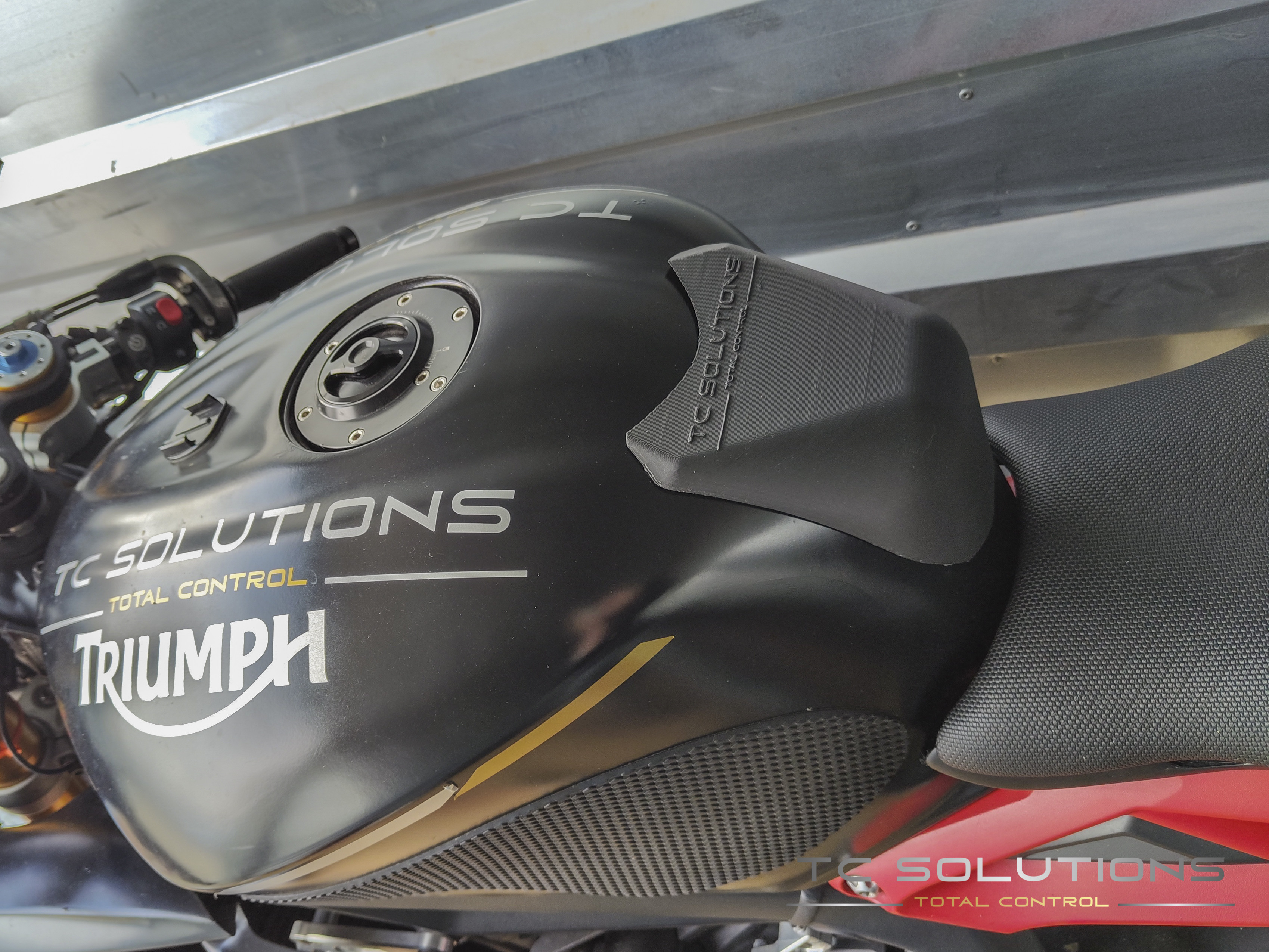 Tank extansion for triump motorcycles